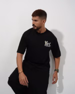 Men wearing black oversized drop shoulder T-shirt by Megamart