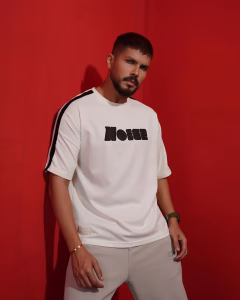 Men wearing white oversized drop shoulder T-shirt by Megamart